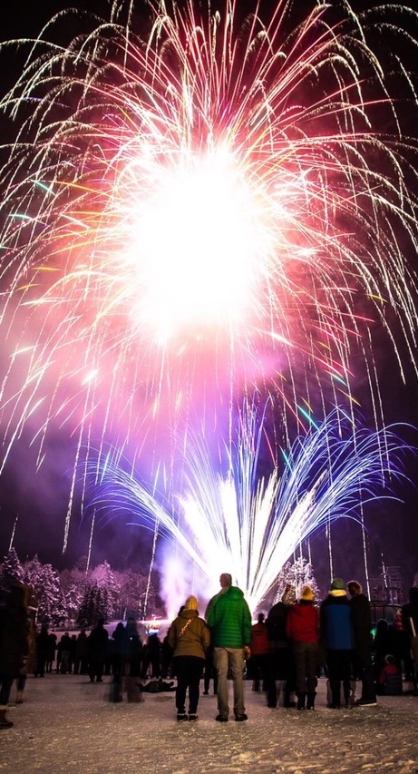 Fireworks explode during New Year's Eve in Teton Village, WY.